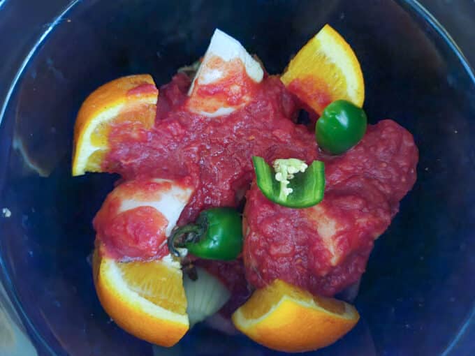 Jalapenos added to slow cooker.
