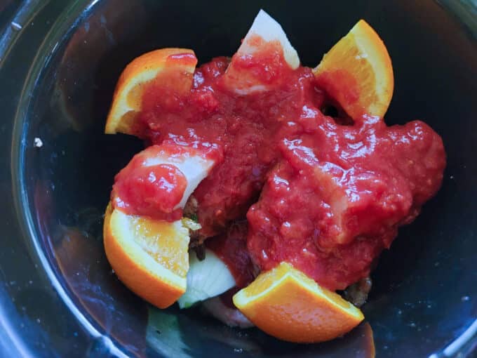 Tomatoes poured over other ingredients.