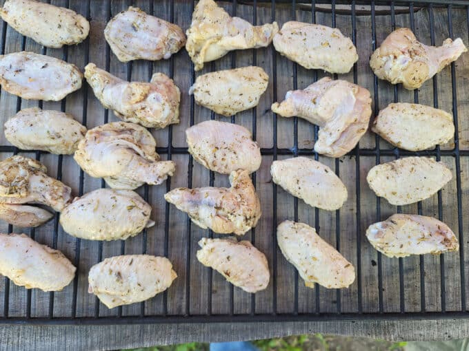 Wings placed on grate.