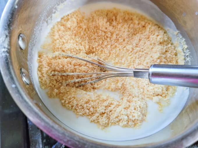 Parmesan cheese added to thickened sauce.