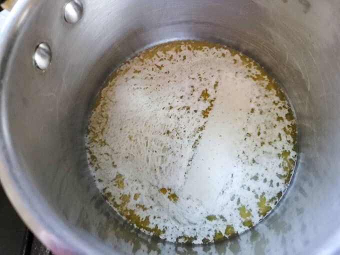 Melted butter in saucepan.