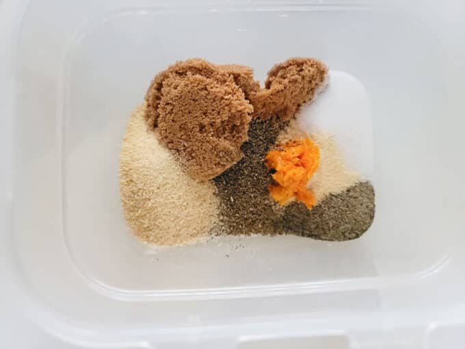 Rub ingredients in plastic container.
