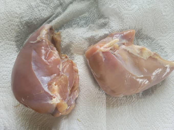 Brined breasts on paper towel.