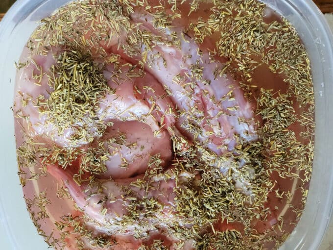 Brine added to rabbit and spices.
