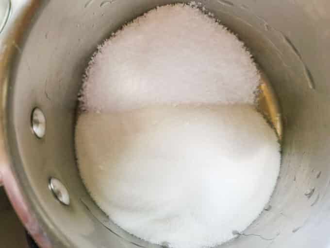 Salt and sugar in pot.