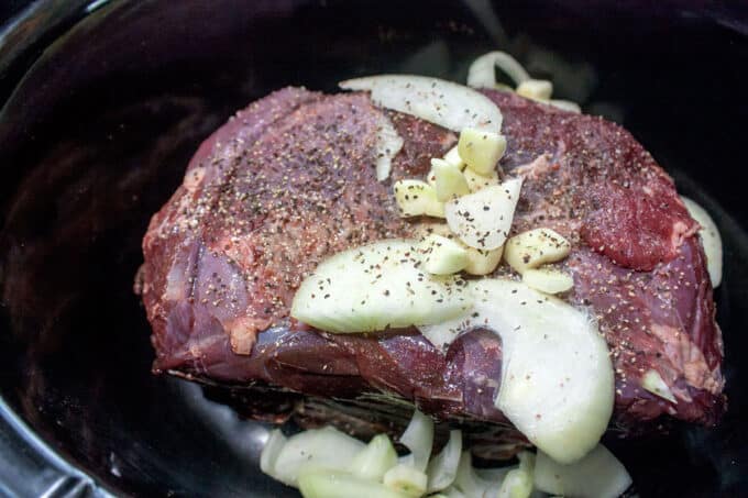Roast topped with onion, garlic and spices.
