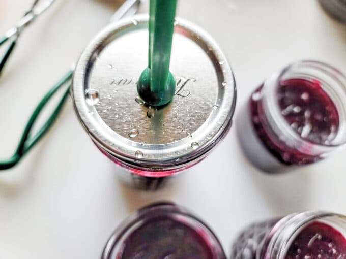 Placed lid on jar with jar lifter tool.