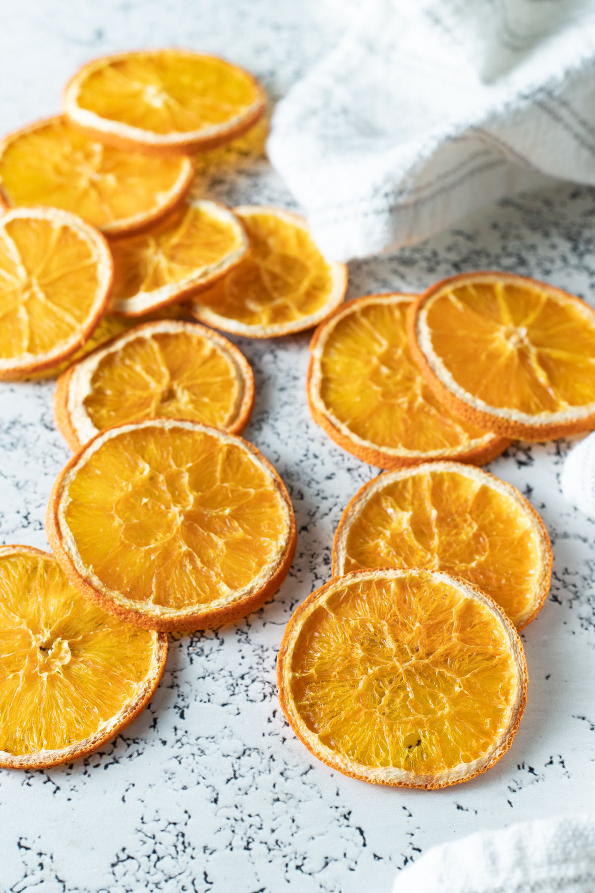 Orange slices arranged on white background.