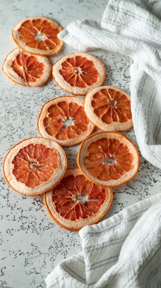 Dehydrated grapefruit on white background.