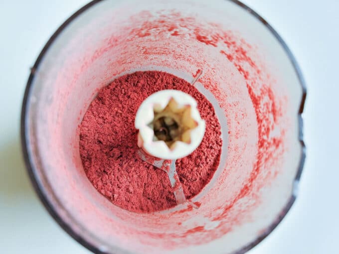 Powdered raspberries in bowl.