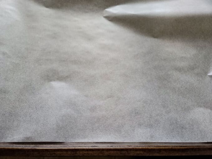 Parchment paper lined baking sheet.