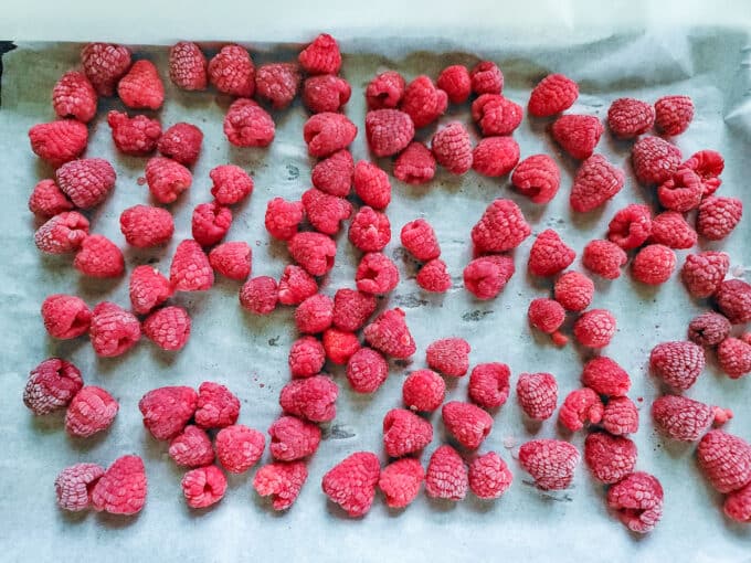 Frozen berries on baking sheet.