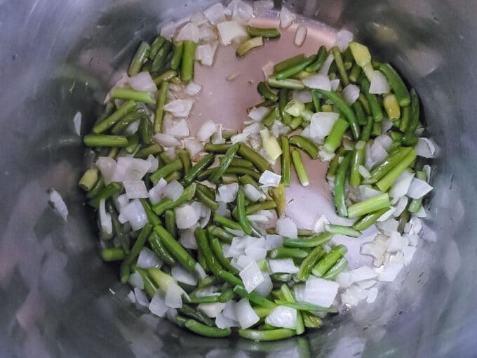 Sweating vegetables in olive oil.