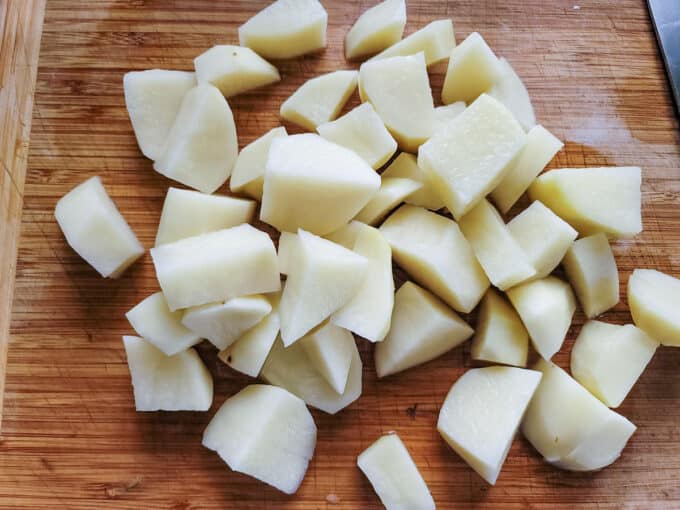 Chopped potatoes on board.