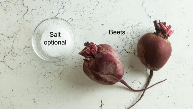 Beets and salt on white board.