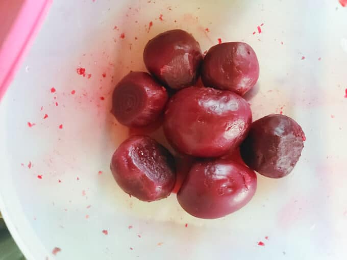 Peeled beets in a bowl.