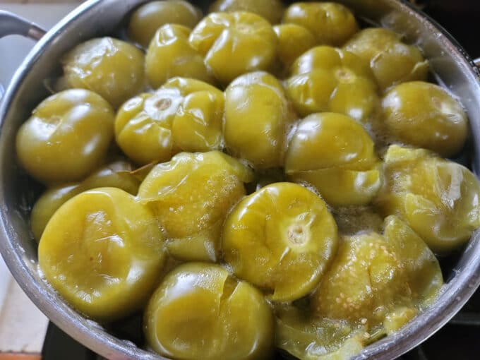 Cooked fruit in pot.