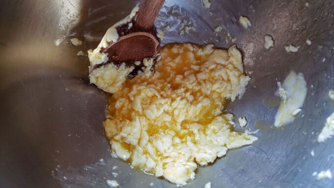 butter and egg mixed in bowl.