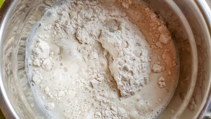 Yeast mixture added to remaining flour.