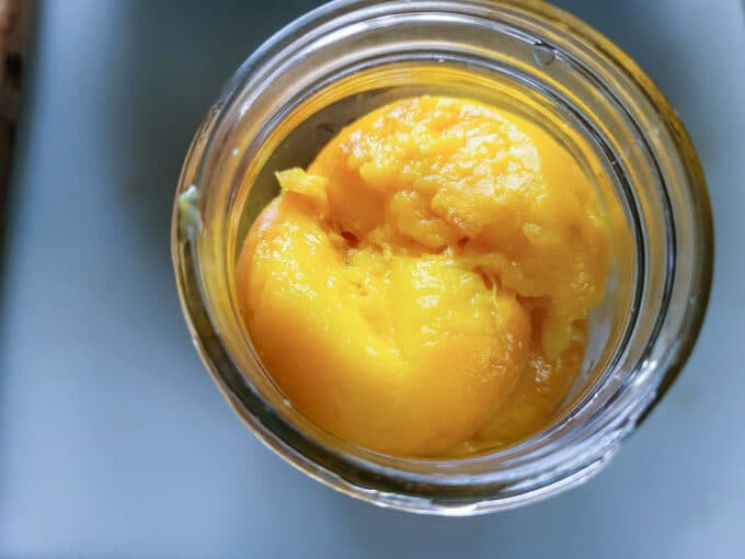 Peaches added to jar.