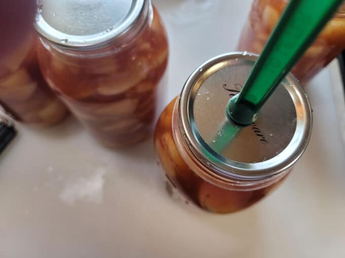 Using a lid lifter to add lid/