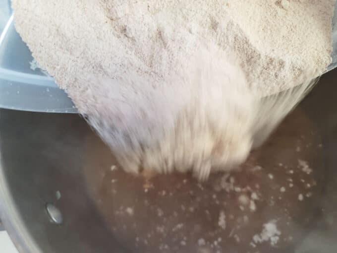 Stirring in sugar mixture.