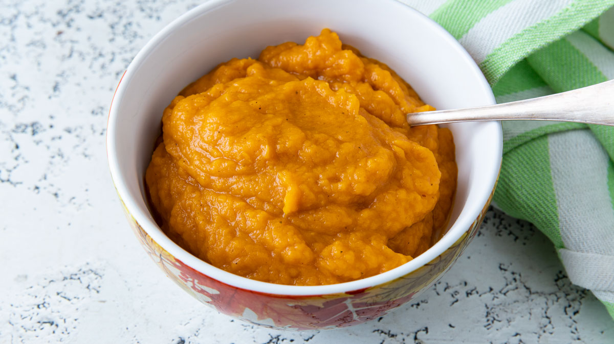 Squash puree on light background.