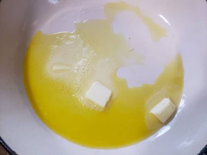 Butter and oil in Dutch oven.