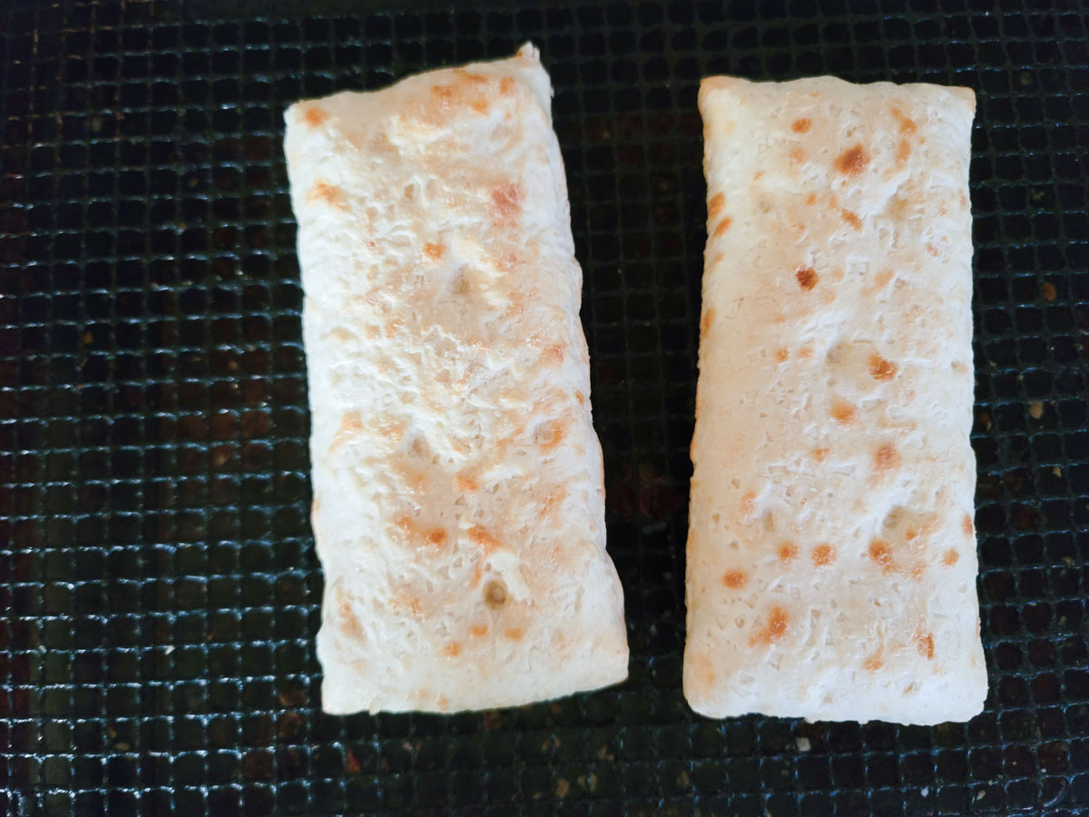 2 hot pockets on air fryer basket.