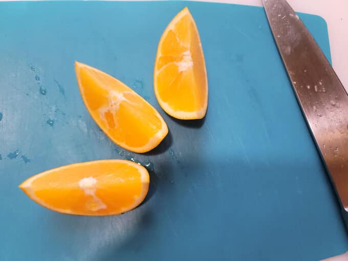 Orange cut into wedges.