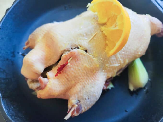 Orange juice rubbed over duck skin.
