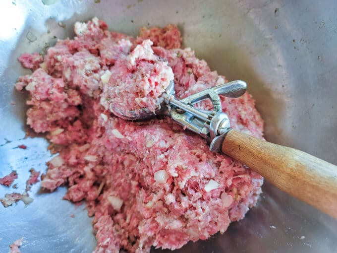 Ice cream scoop forming meatballs.