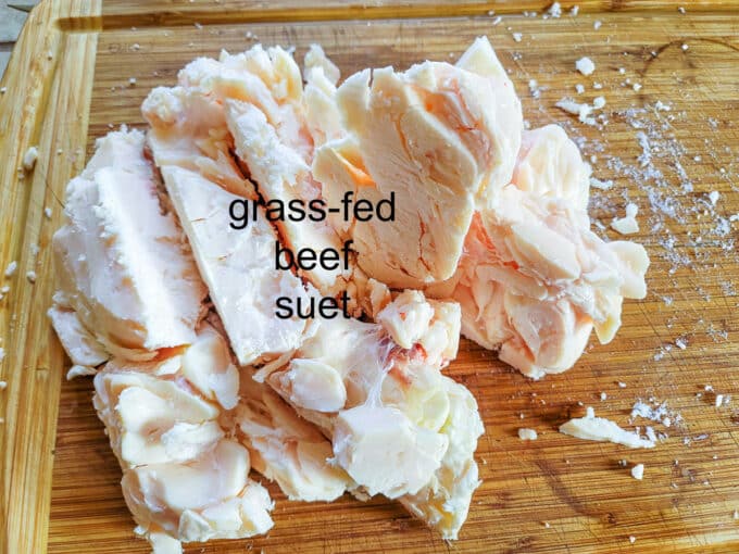 Grass fed beef suet on a cutting board.