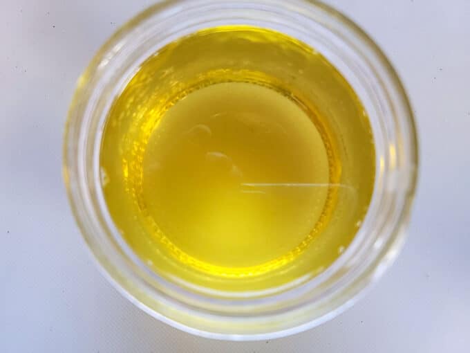 Liquid gold in canning jar.