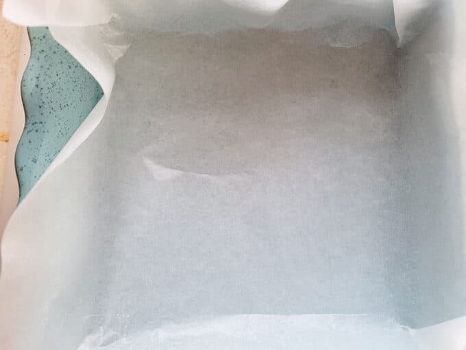 Parchment lined baking dish.