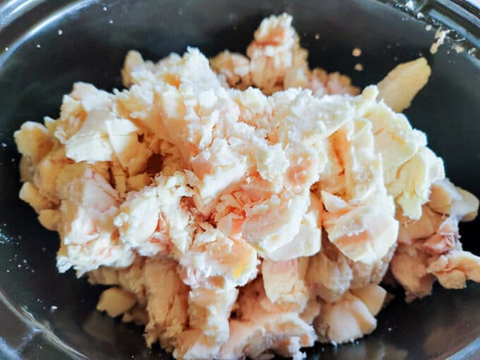 Chopped suet in crockpot.