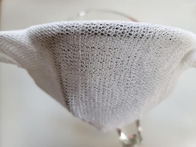 Lined fine mesh strainer.