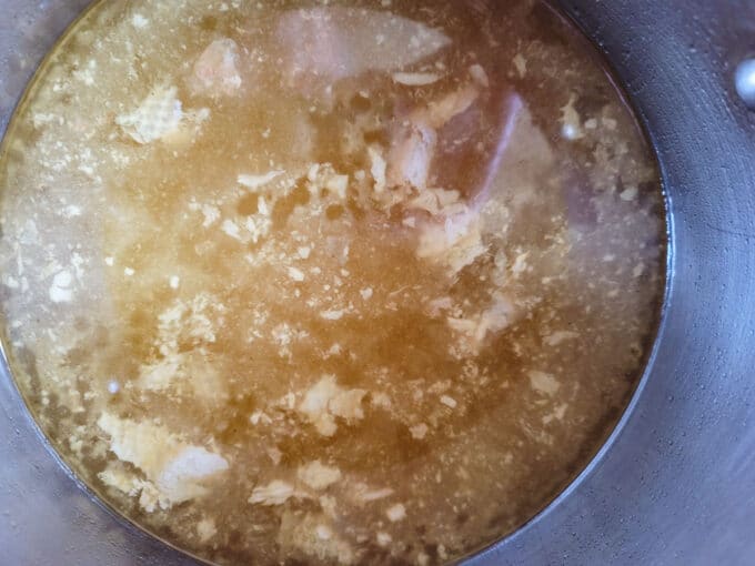 Stock heating in large pot.