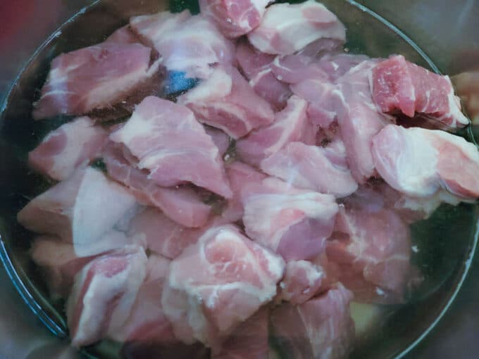 Pork covered with water.