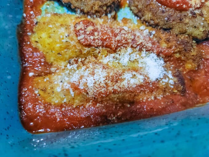 Sprinkled parmesan cheese on op of loin.