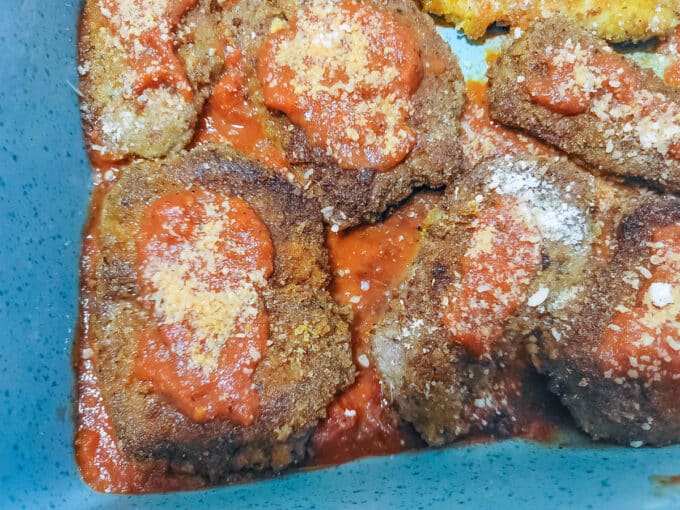 Venison sprinkled with parmesan cheese.