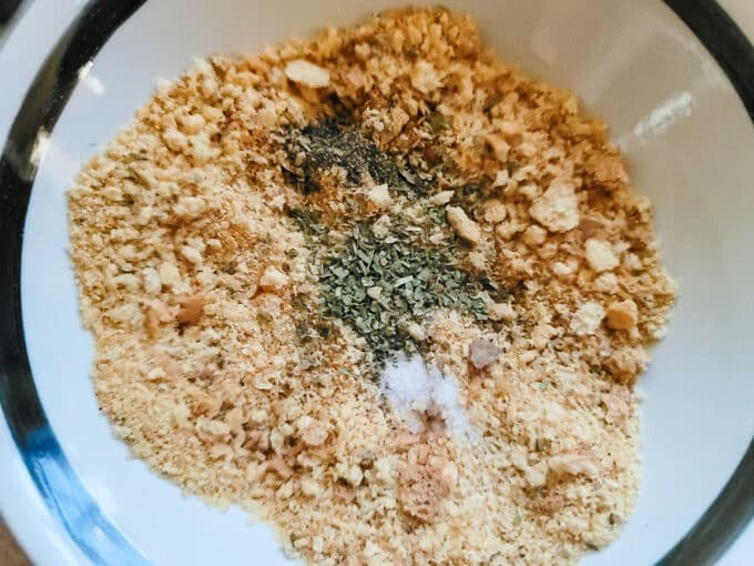 Spices added to bread crumbs.
