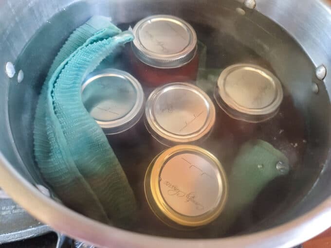 Jars added to the canning pot.
