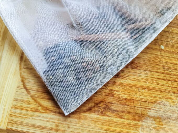 Spices added to a spice bag.