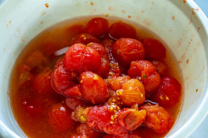 Peeled tomatoes with their juices.
