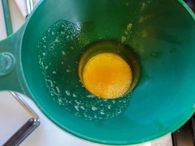 Juice added to pineapple in jars.