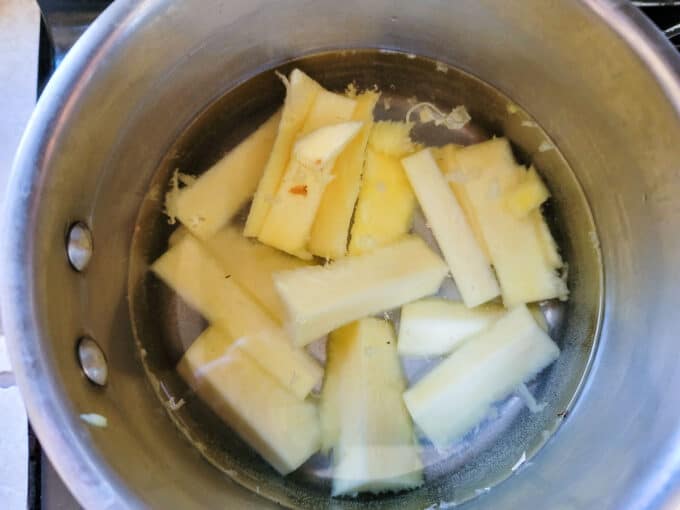 Cores in a saucepan covered with water.