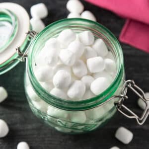 Marshmallows in a green jar.