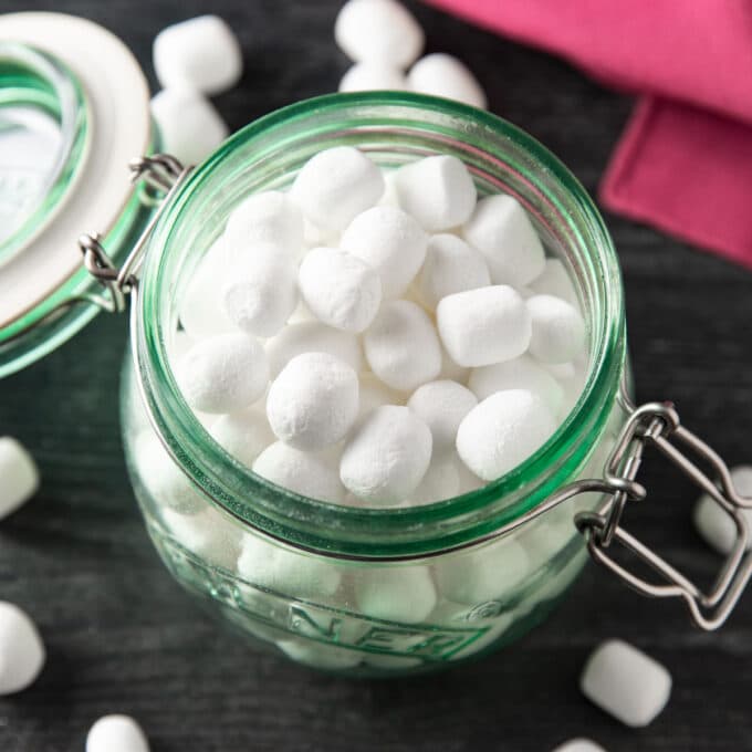 Marshmallows in a green jar.