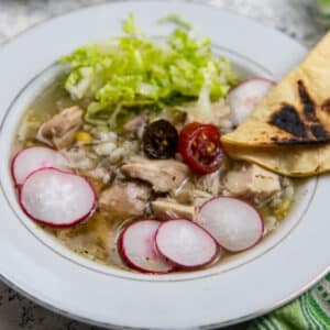 Bowl of Green chicken pozole.